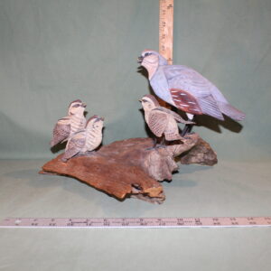 Mama Quail and her Babies on a Branch Figurine
